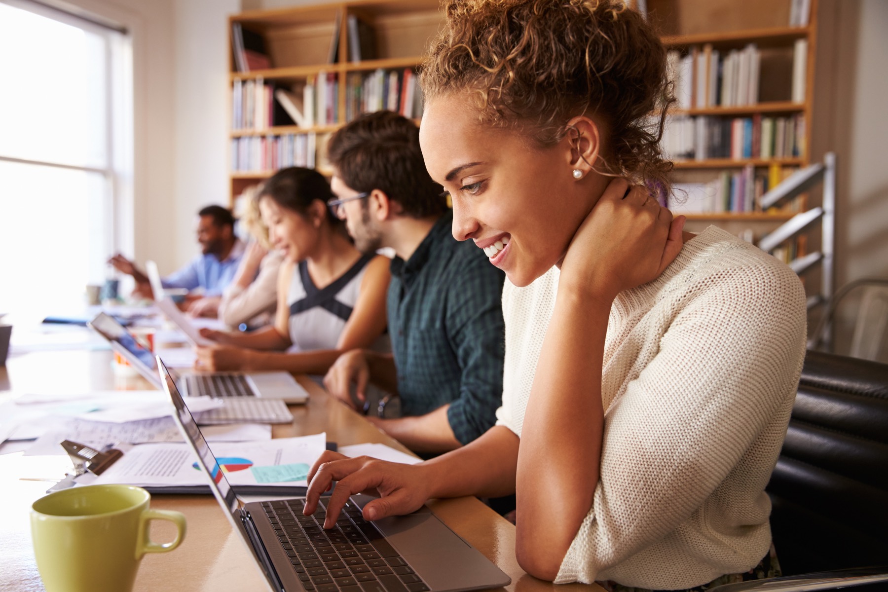 Professionals studying together — the audience the academy educates online